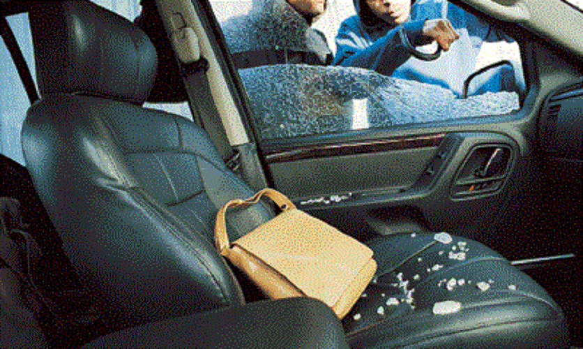 Vidro Quebrado Assalto - bolsa interior do carro